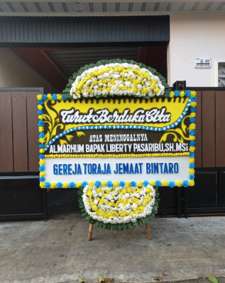 Papan Bunga Duka di Joring Lombang